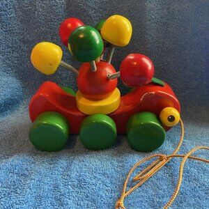 WALTER TWIRLING SPINNING COLORFUL TODDLER WOOD SLUG PULL TOY, GERMANY